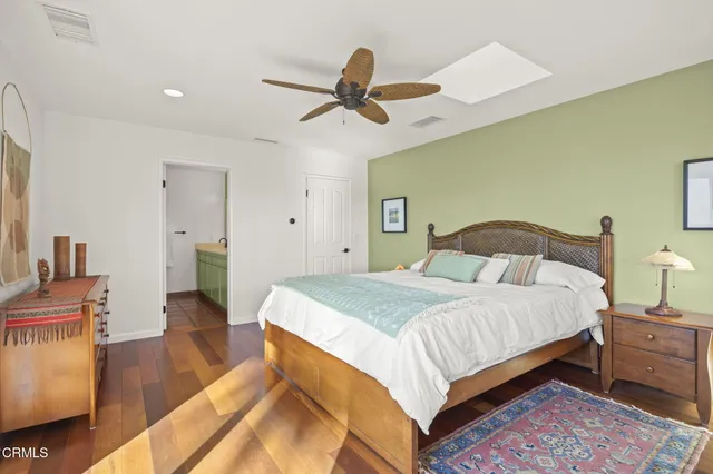 a view of a lot of chairs and a flower pot