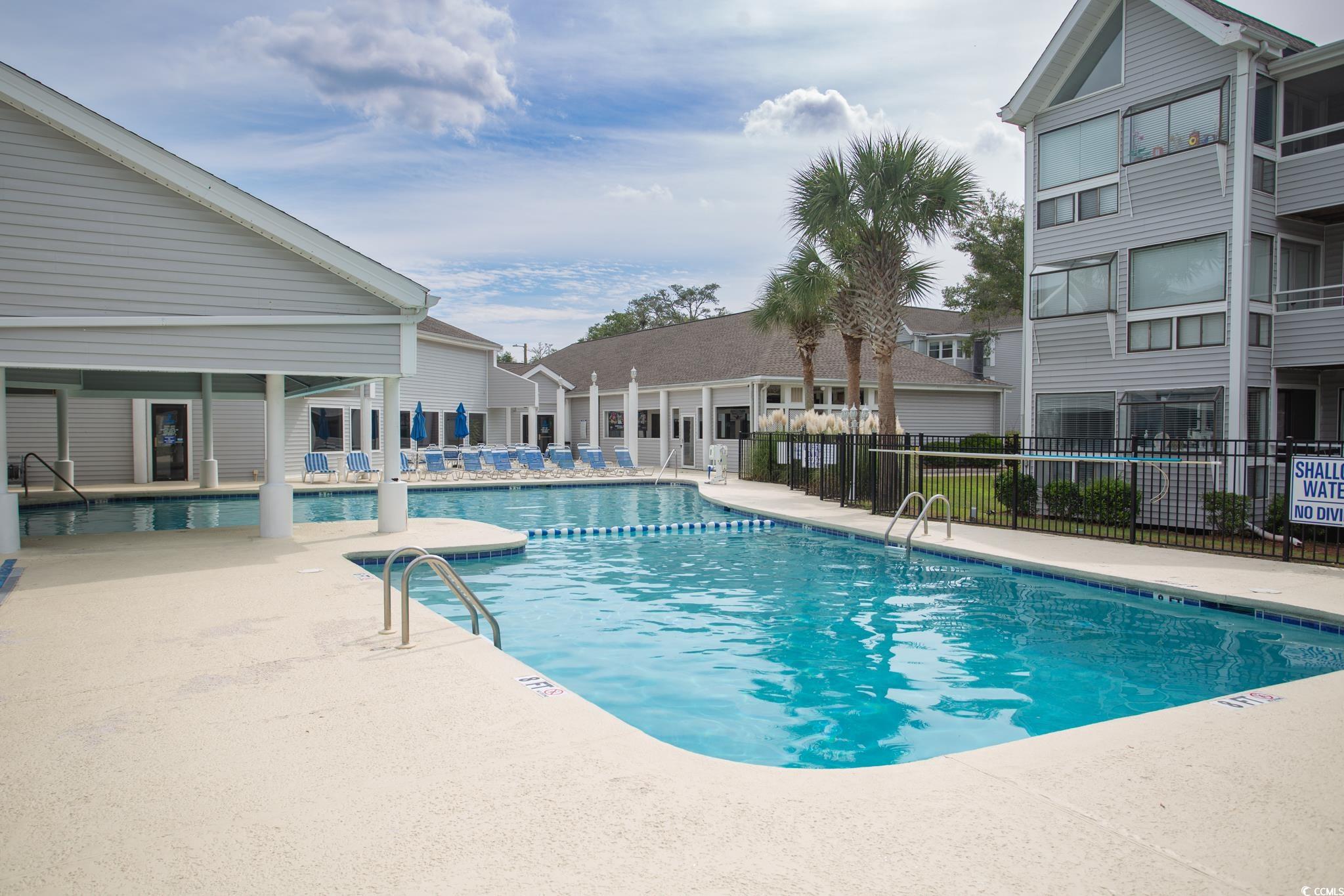 351 Lake Arrowhead Road, Unit 25404 Myrtle Beach, SC 29572 - Photo 30 of 37 View of pool with a patio area