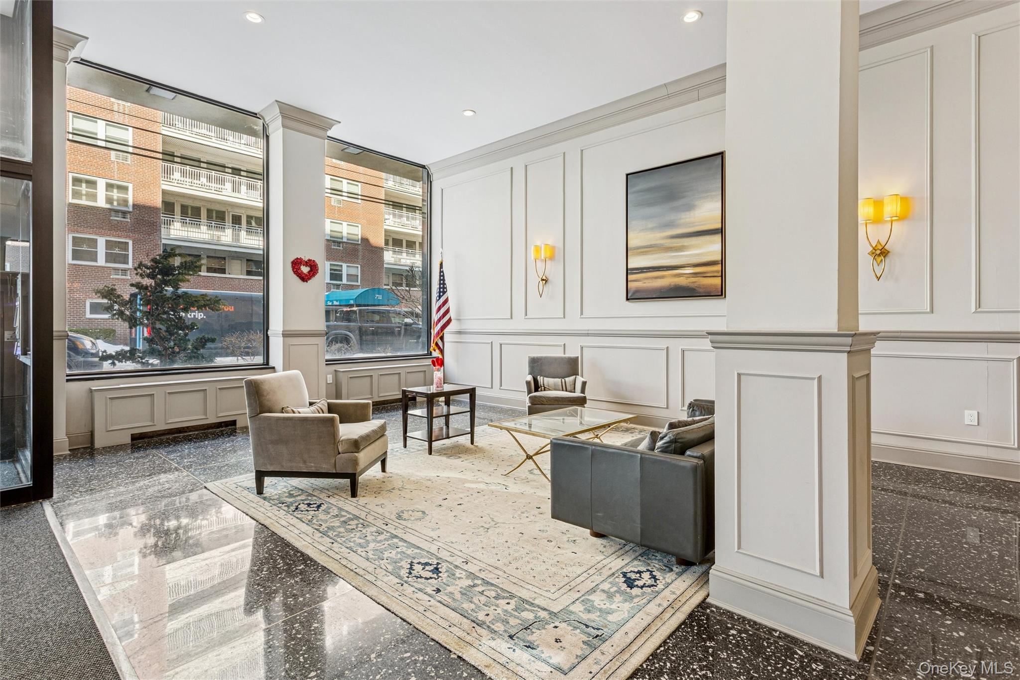 700 Shore Road, Unit 5U Long Beach, NY 11561 - Photo 2 of 21 a living room with stainless steel appliances granite countertop furniture and a window