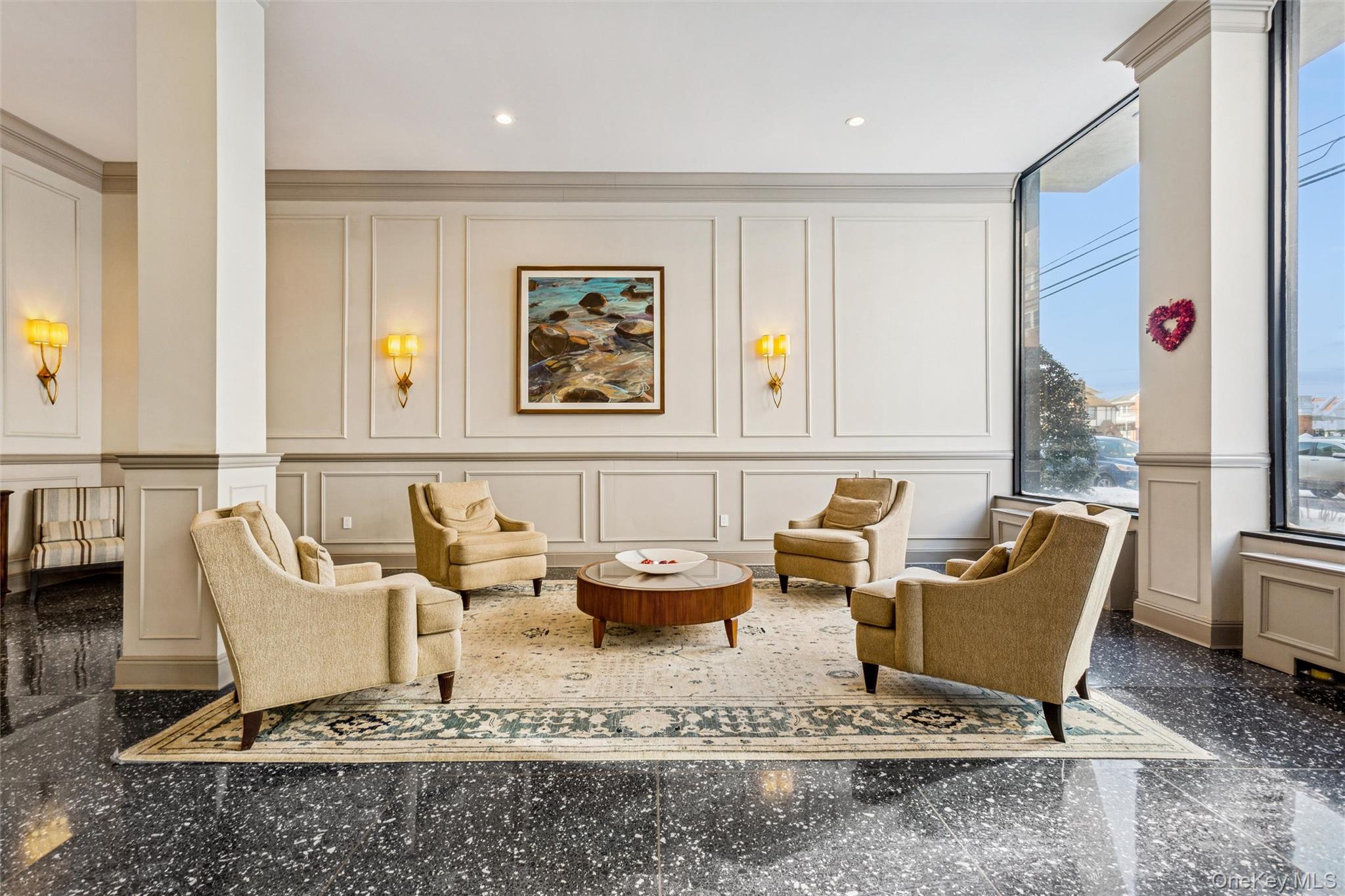 700 Shore Road, Unit 5U Long Beach, NY 11561 - Photo 4 of 21 a living room with furniture and wooden floor