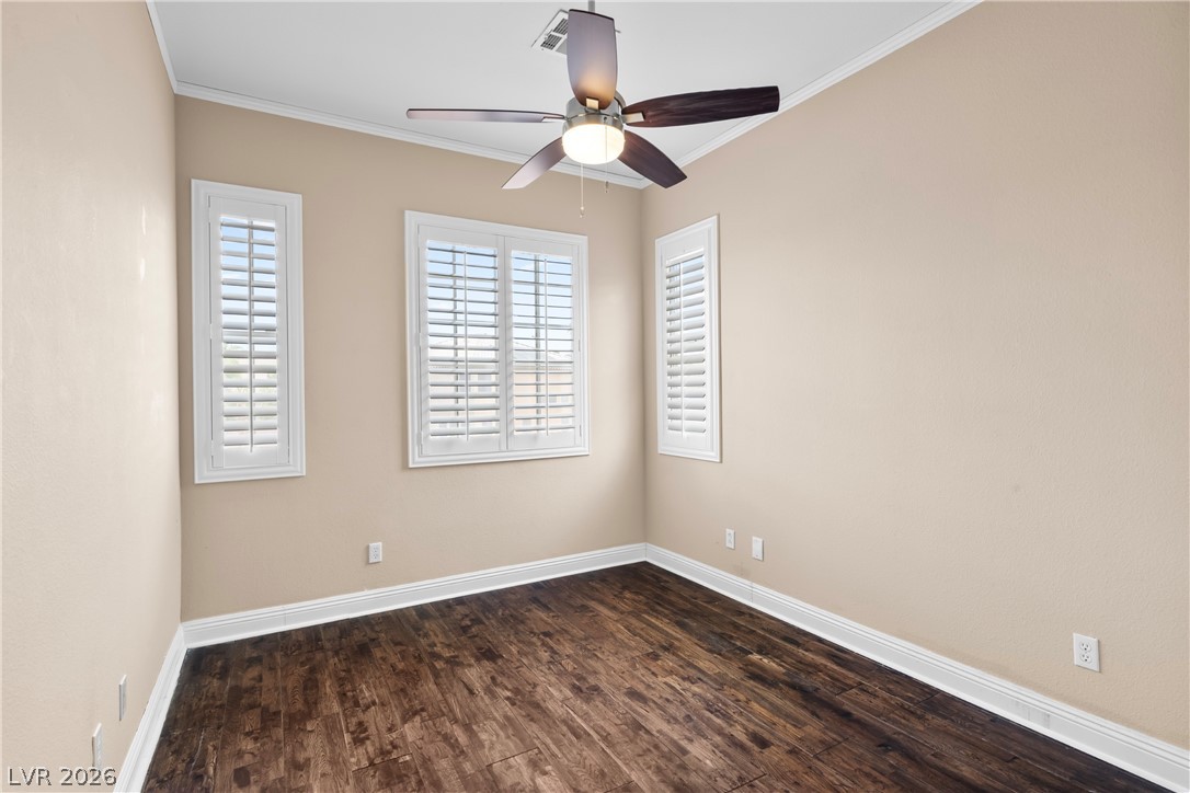 708 Vortex Avenue Henderson, NV 89002 - Photo 42 of 71 Wood flooring and natural light elevate this inviting and versatile room.