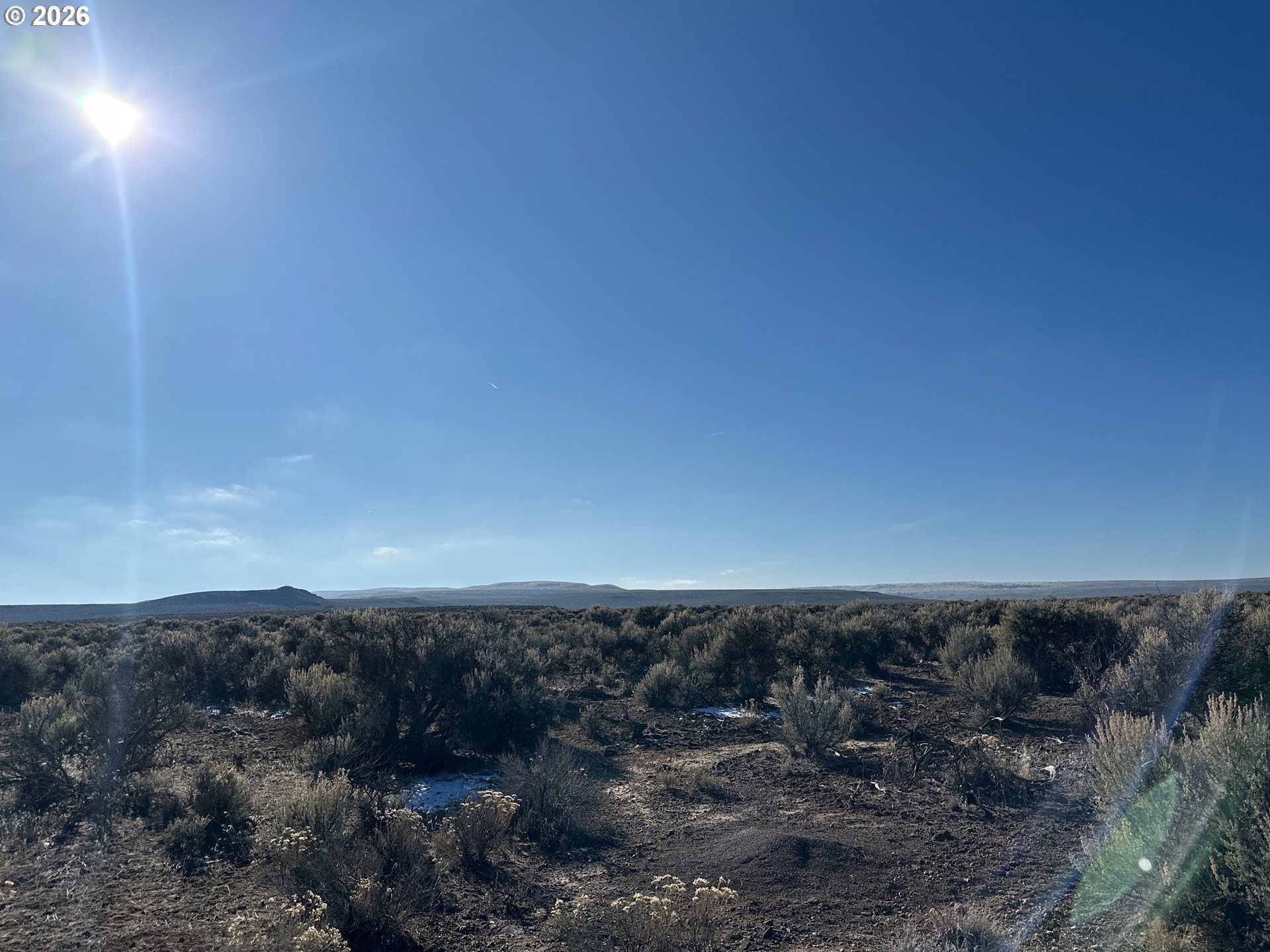 South Fandango Road, Unit 2100 Christmas Valley, OR 97641 - Photo 1 of 33 a view of a dry yard with trees