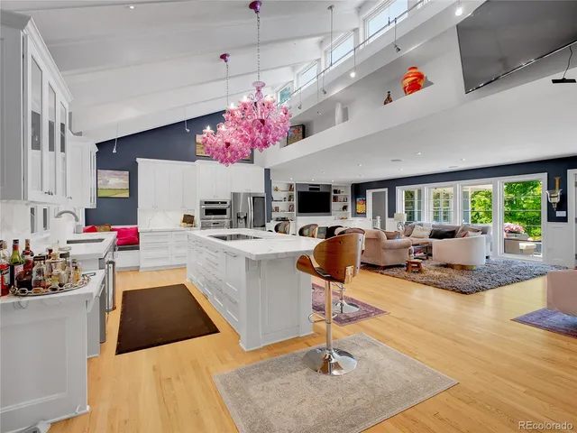 a very nice looking room with a large kitchen area