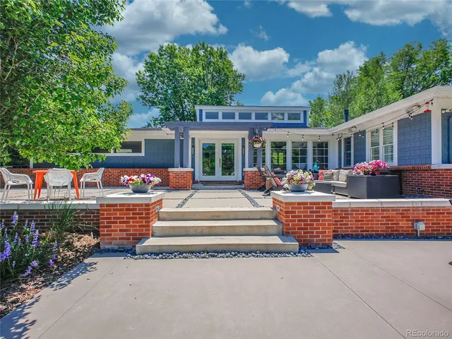 front view of a house with a patio