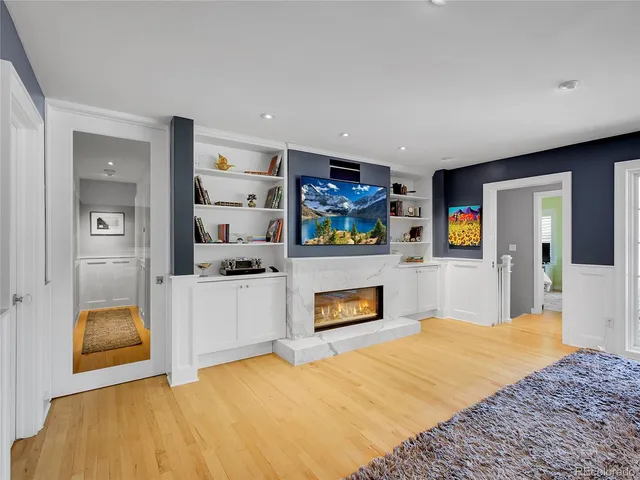 a bedroom with a bed and dresser