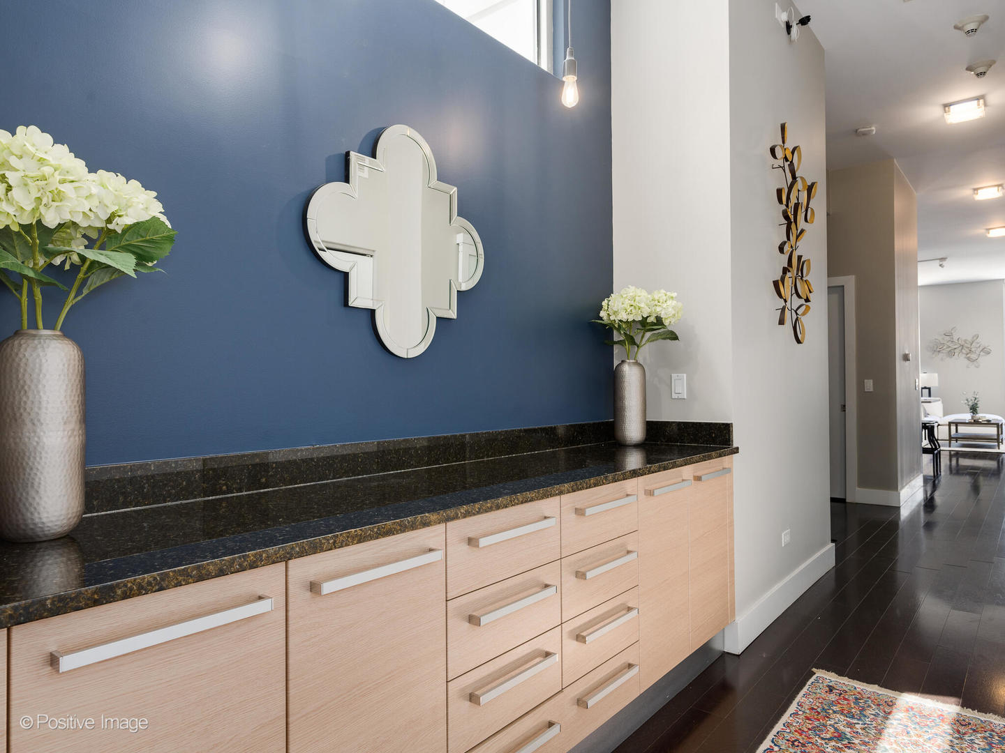 23 North Aberdeen Street, Unit 4S Chicago, IL 60607 - Photo 15 of 24 a bathroom with a granite countertop sink a vanity and a mirror