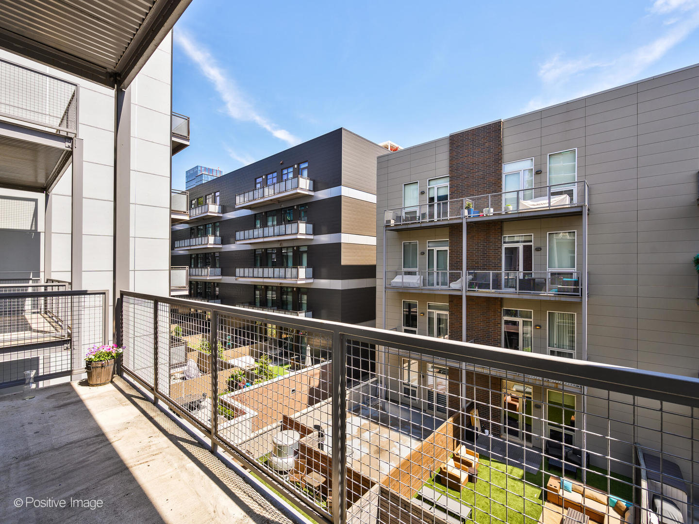 23 North Aberdeen Street, Unit 4S Chicago, IL 60607 - Photo 23 of 24 a view of balcony with a flat screen tv