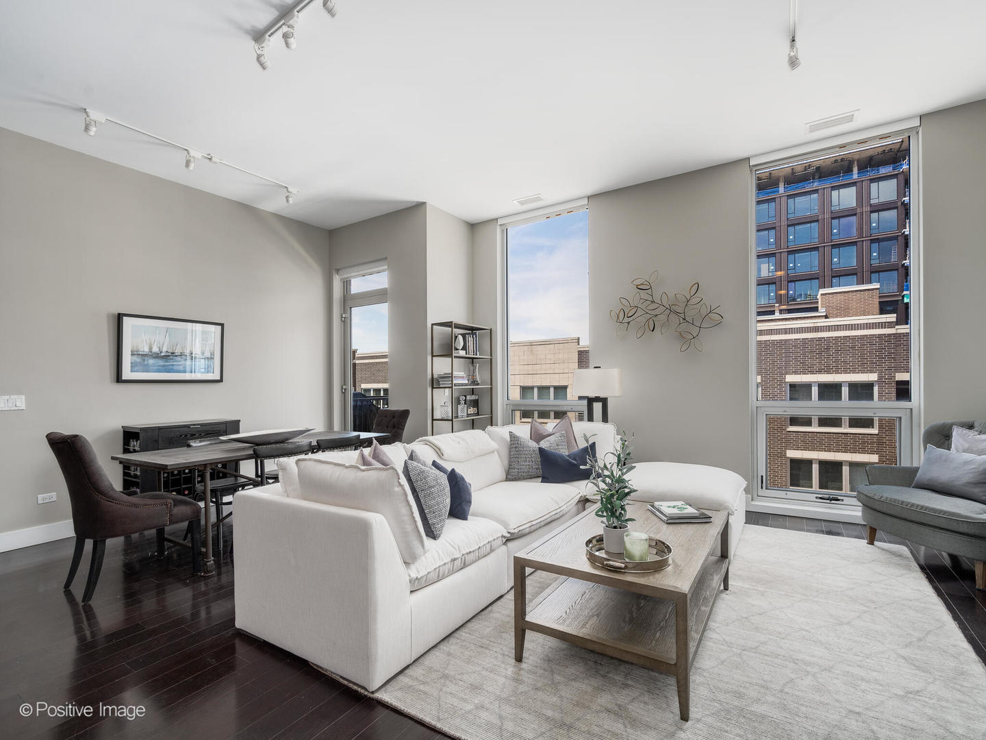 23 North Aberdeen Street, Unit 4S Chicago, IL 60607 - Photo 6 of 24 a living room with furniture a rug and a window