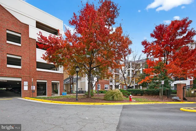 a view of a swimming pool with an outdoor seating