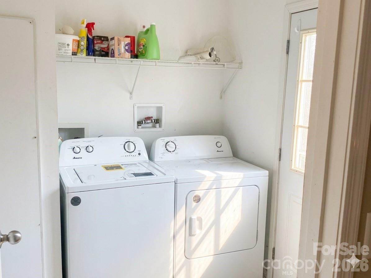 3233 Alamo Drive Trinity, NC 27370 - Photo 14 of 15 a utility room with dryer and washer