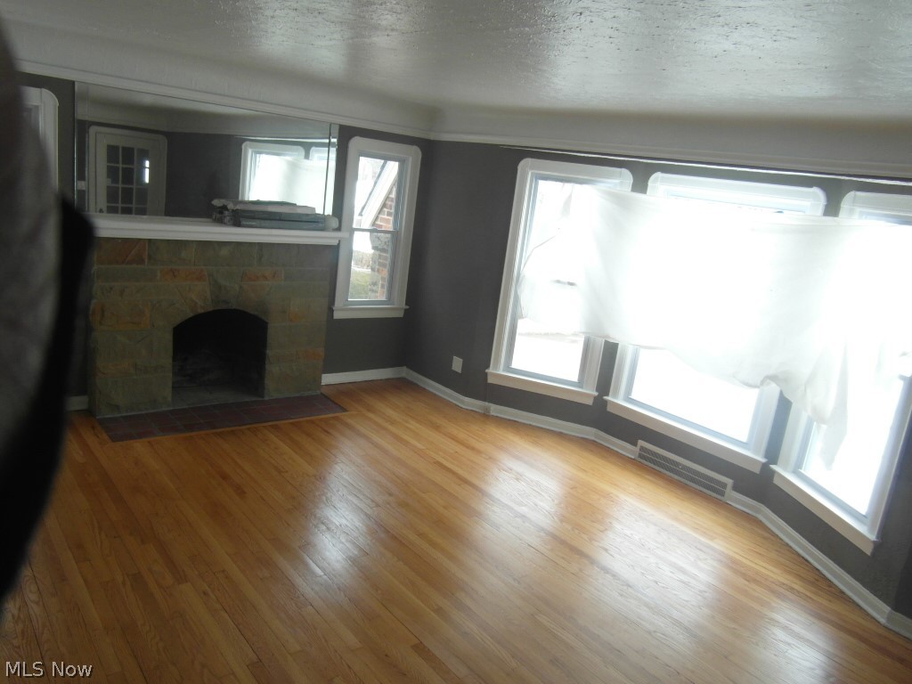 1222 Castleton Road Cleveland, OH 44121 - Photo 11 of 32 living room with fire place