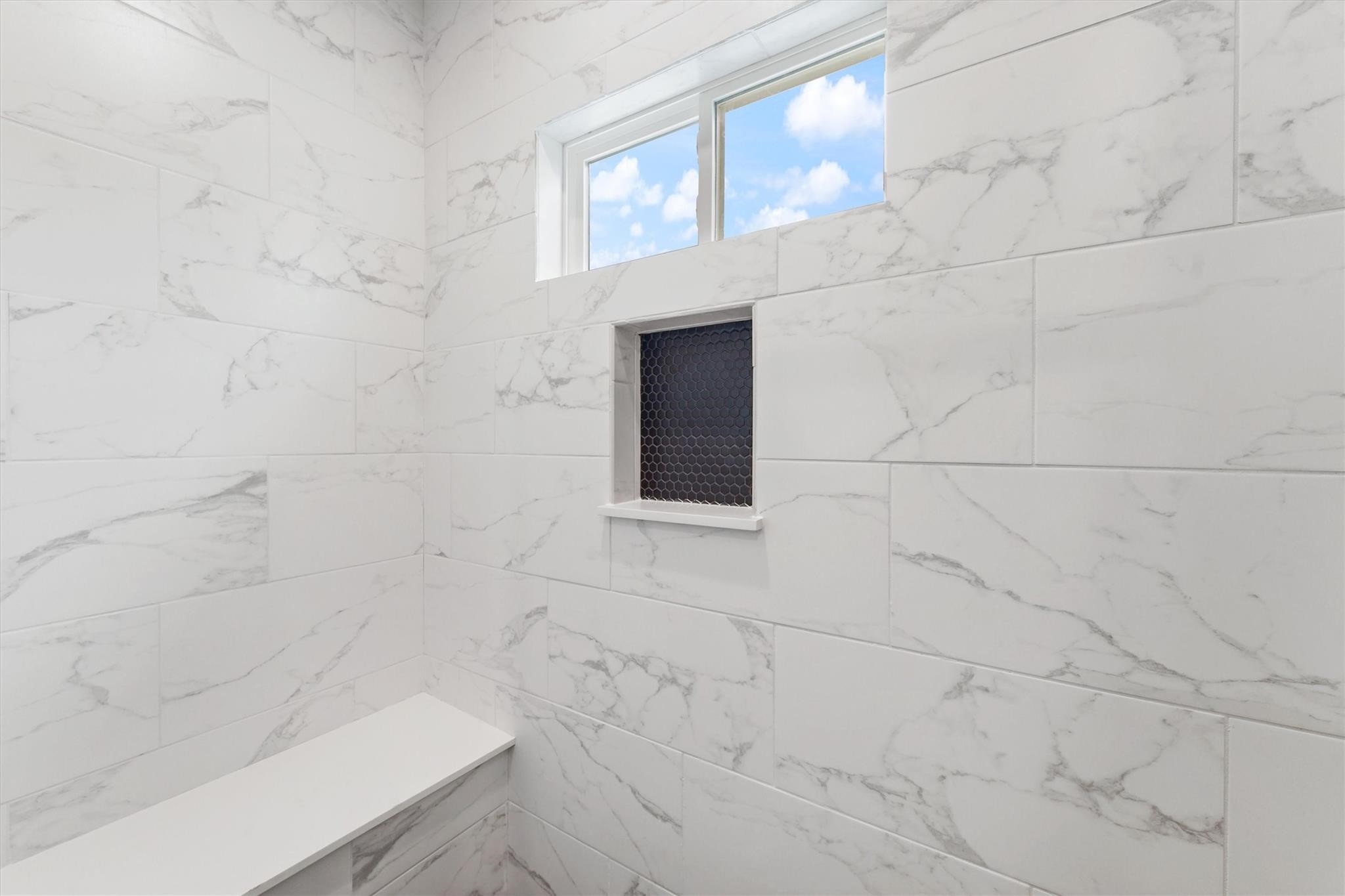 2131 Blalock Road, Unit G Houston, TX 77080 - Photo 17 of 28 a bathroom with a bathtub and shower