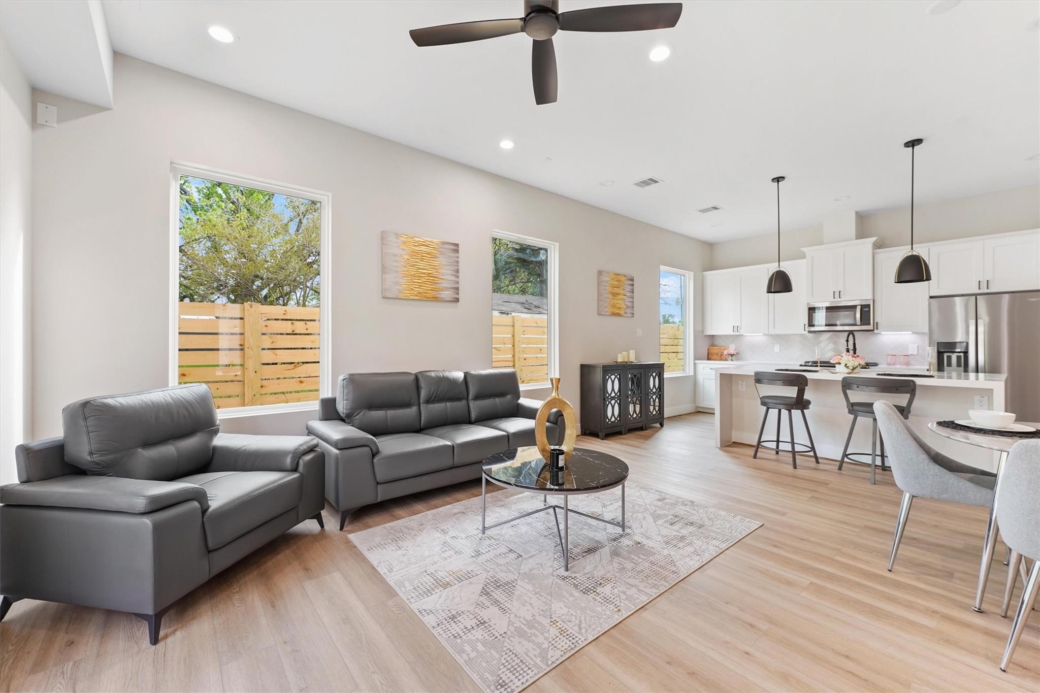 2131 Blalock Road, Unit G Houston, TX 77080 - Photo 3 of 28 a living room with furniture and a large window
