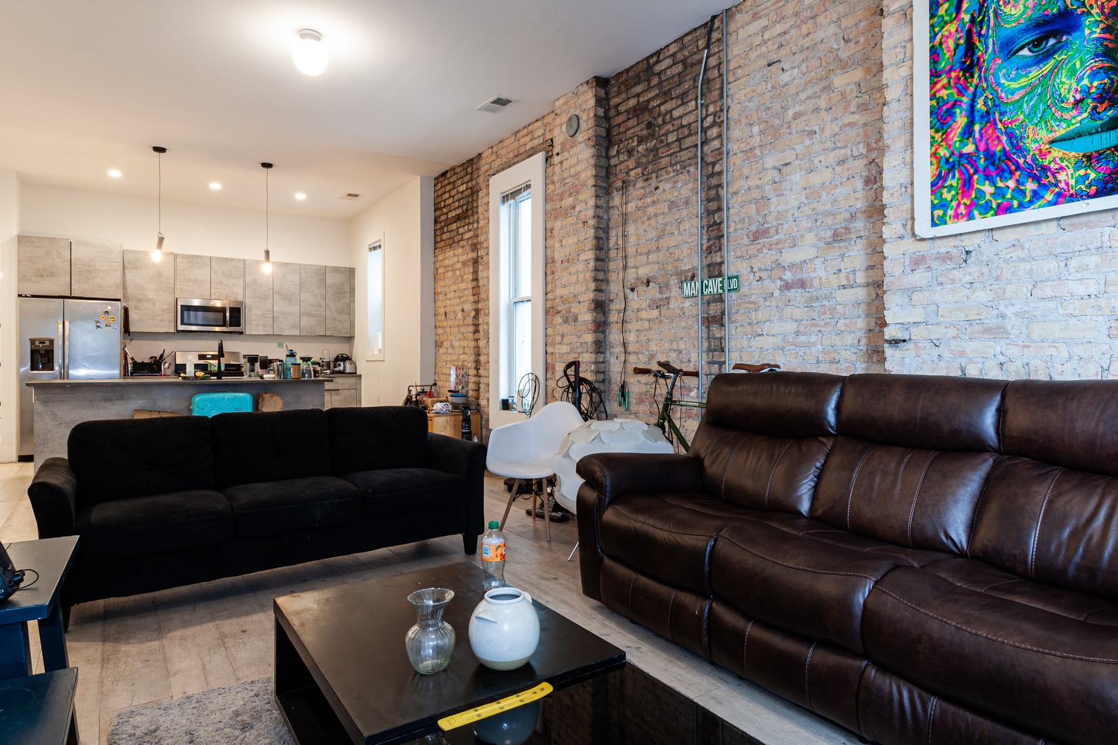 324 South Racine Avenue, Unit 4N Chicago, IL 60607 - Photo 6 of 9 a living room with furniture and a painting