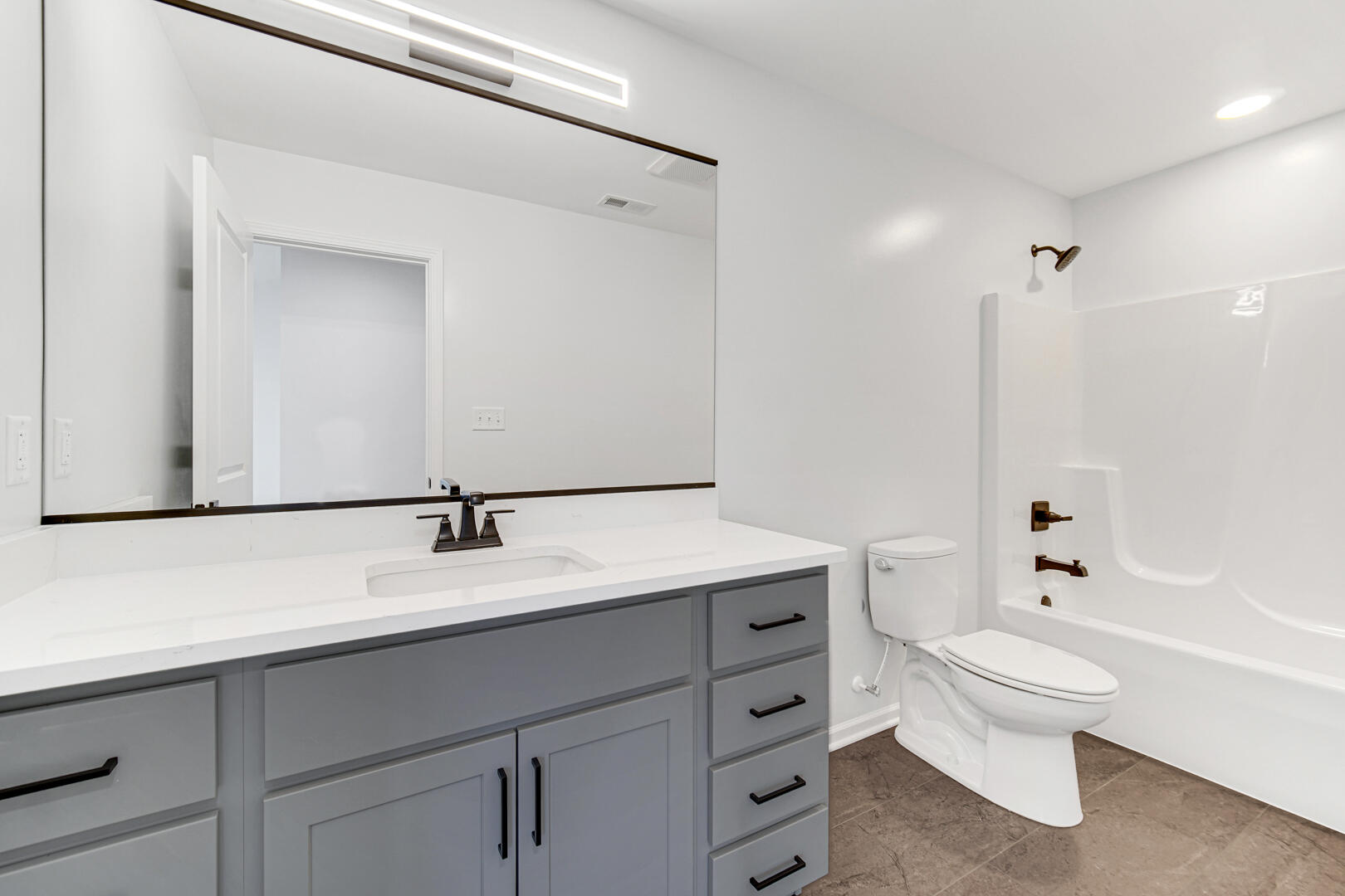 708 Druim Trail Crown Point, IN 46307 - Photo 23 of 27 a bathroom with a sink a toilet and a mirror
