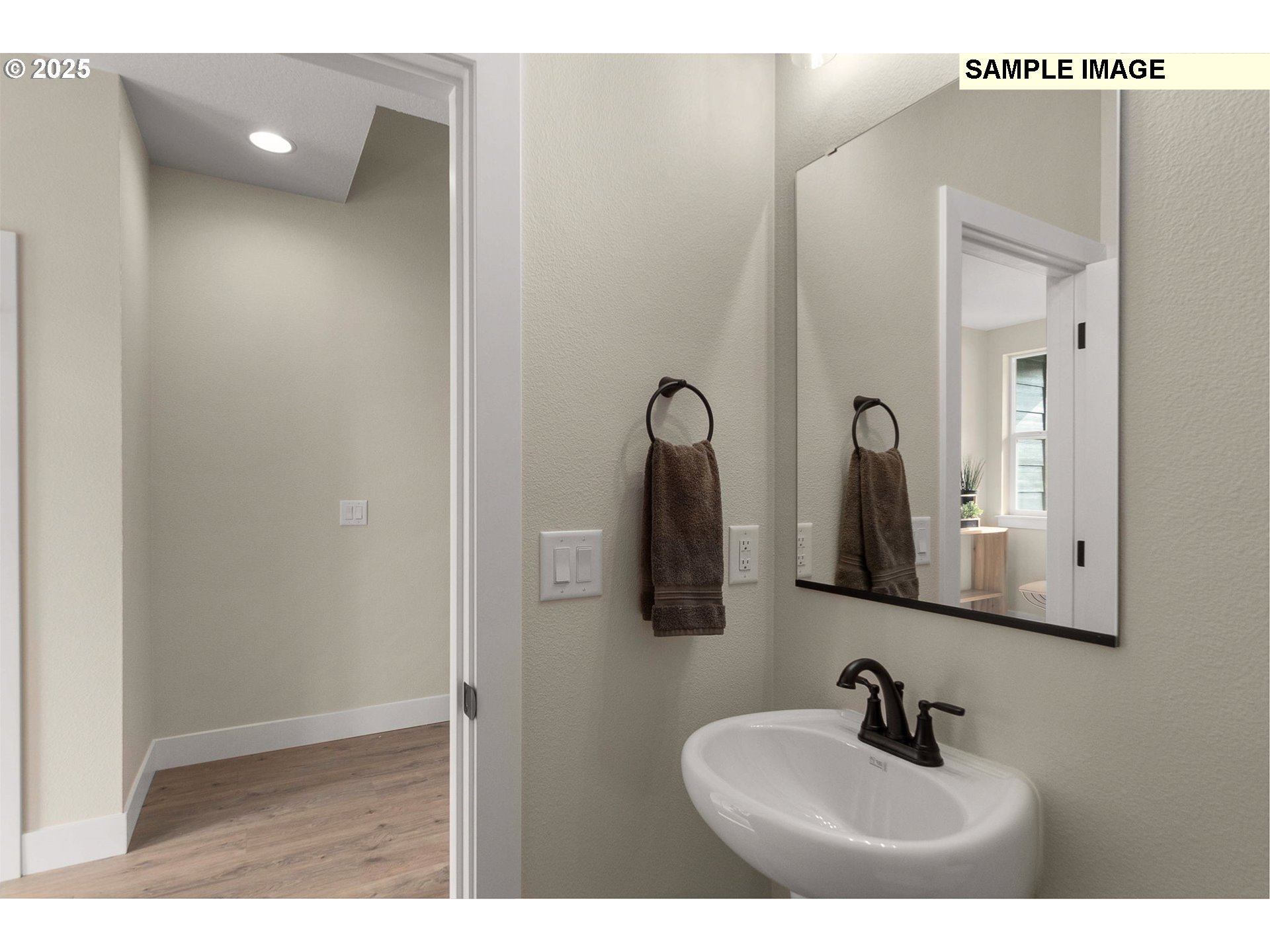 4637 Northwest Camas Meadows Drive Camas, WA 98607 - Photo 8 of 18 a bathroom with a sink and a mirror