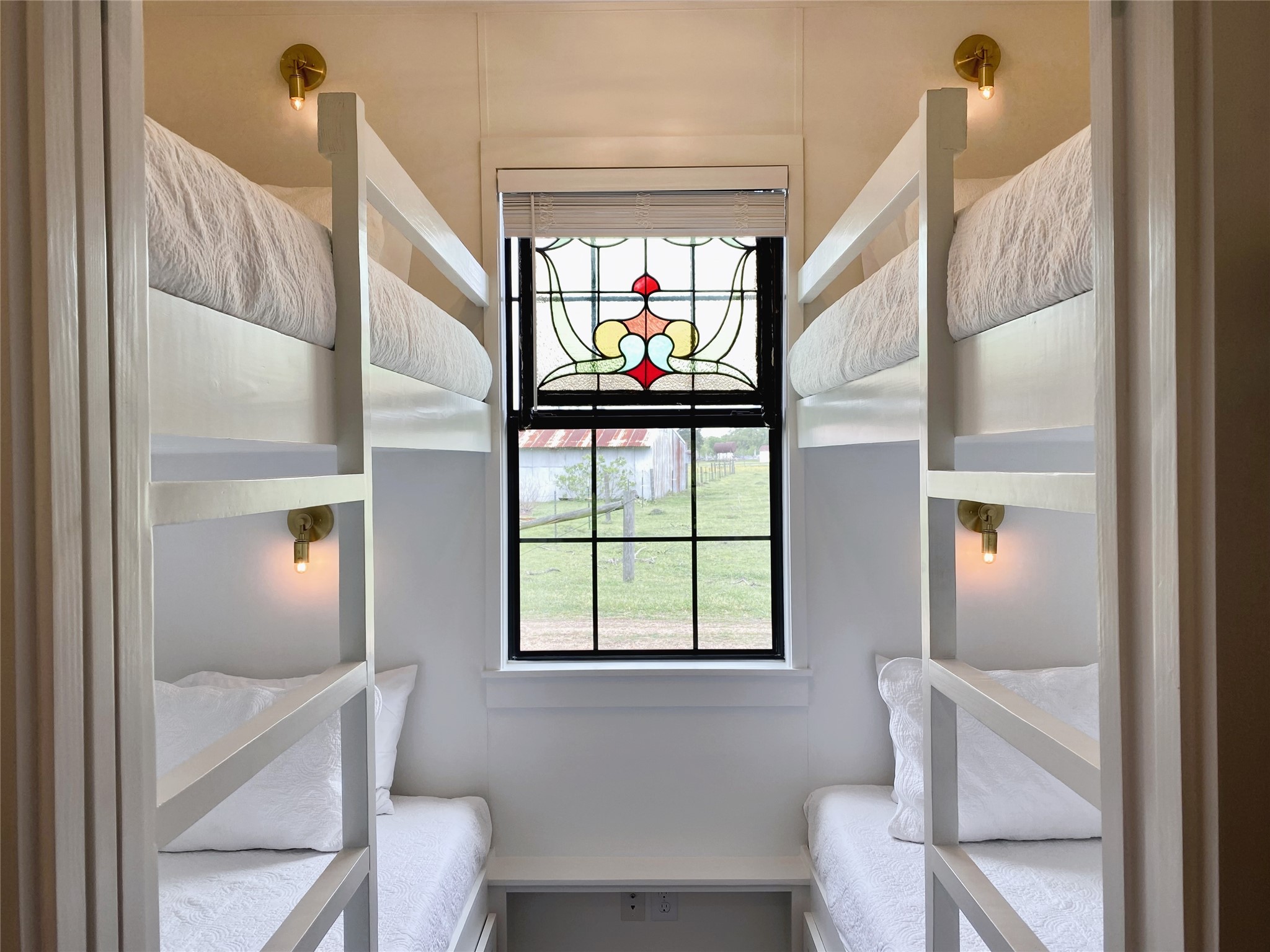 6978 Skull Creek Road Fayetteville, TX 78940 - Photo 15 of 24 "Bunkroom" bedroom sleeps 4 in extra-long twin built-in bunks, extra storage underneath.