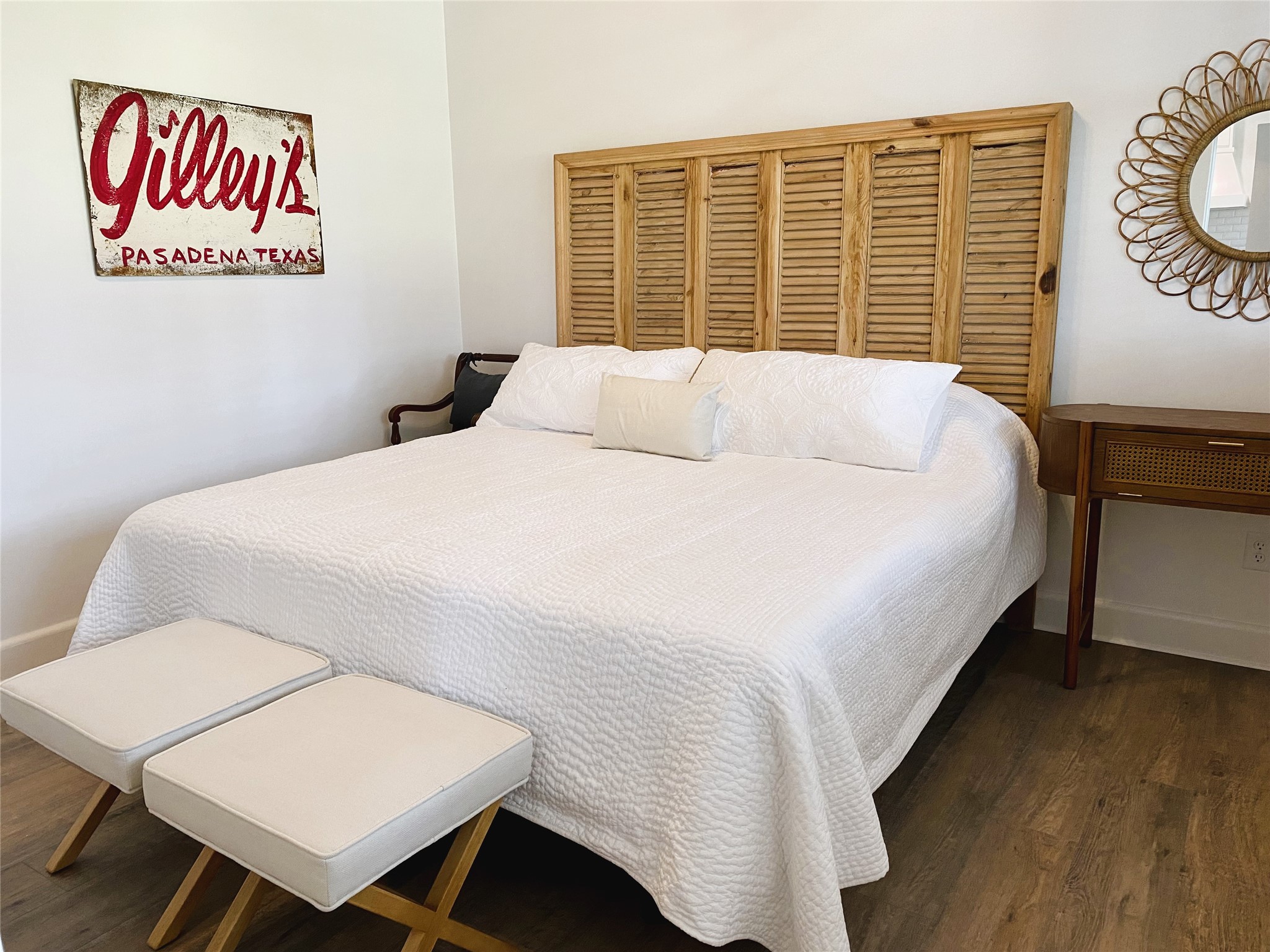 6978 Skull Creek Road Fayetteville, TX 78940 - Photo 20 of 24 Primary bedroom in "Bunkhouse" with king bed, large closet & full-sized washer/dryer.