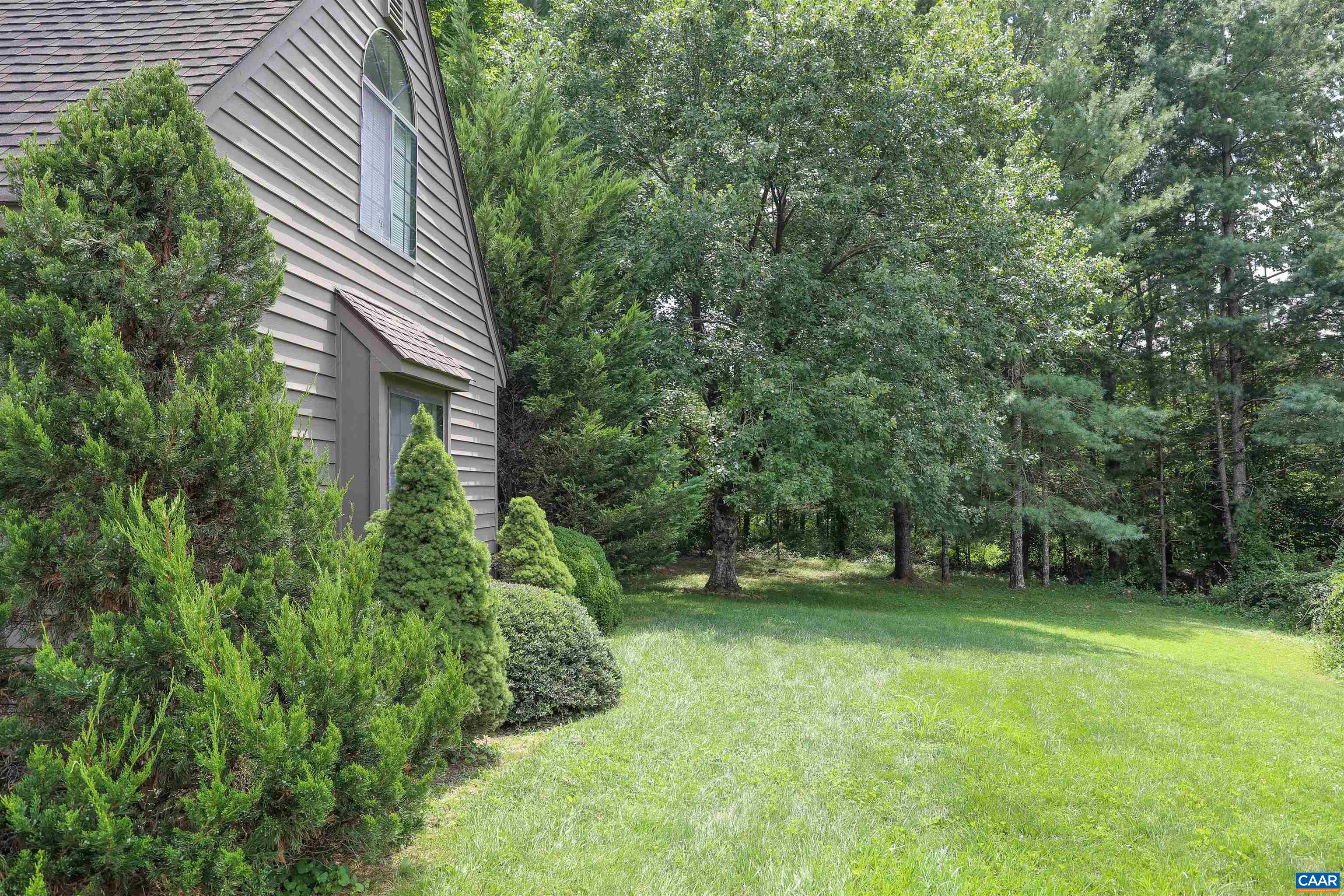 976 Amber Ridge Road Charlottesville, VA 22901 - Photo 3 of 8 a green field with trees in the background