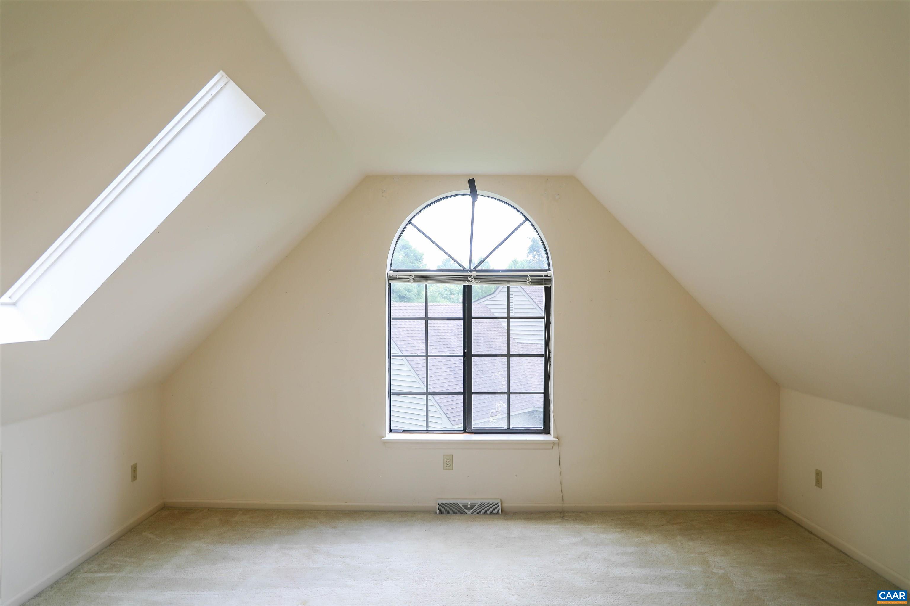 976 Amber Ridge Road Charlottesville, VA 22901 - Photo 8 of 8 an empty room with a window