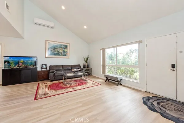 a view of a room with a large window