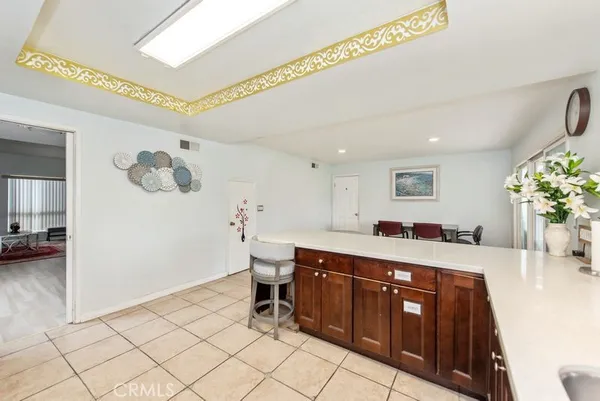 a spacious bathroom with a double vanity sink and a mirror