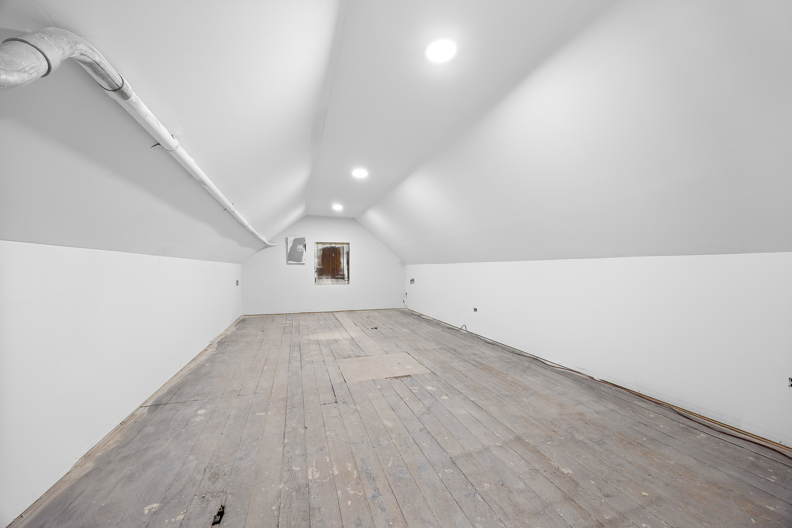 3408 South Carpenter Street Chicago, IL 60608 - Photo 11 of 16 a view of a big room with wooden floor