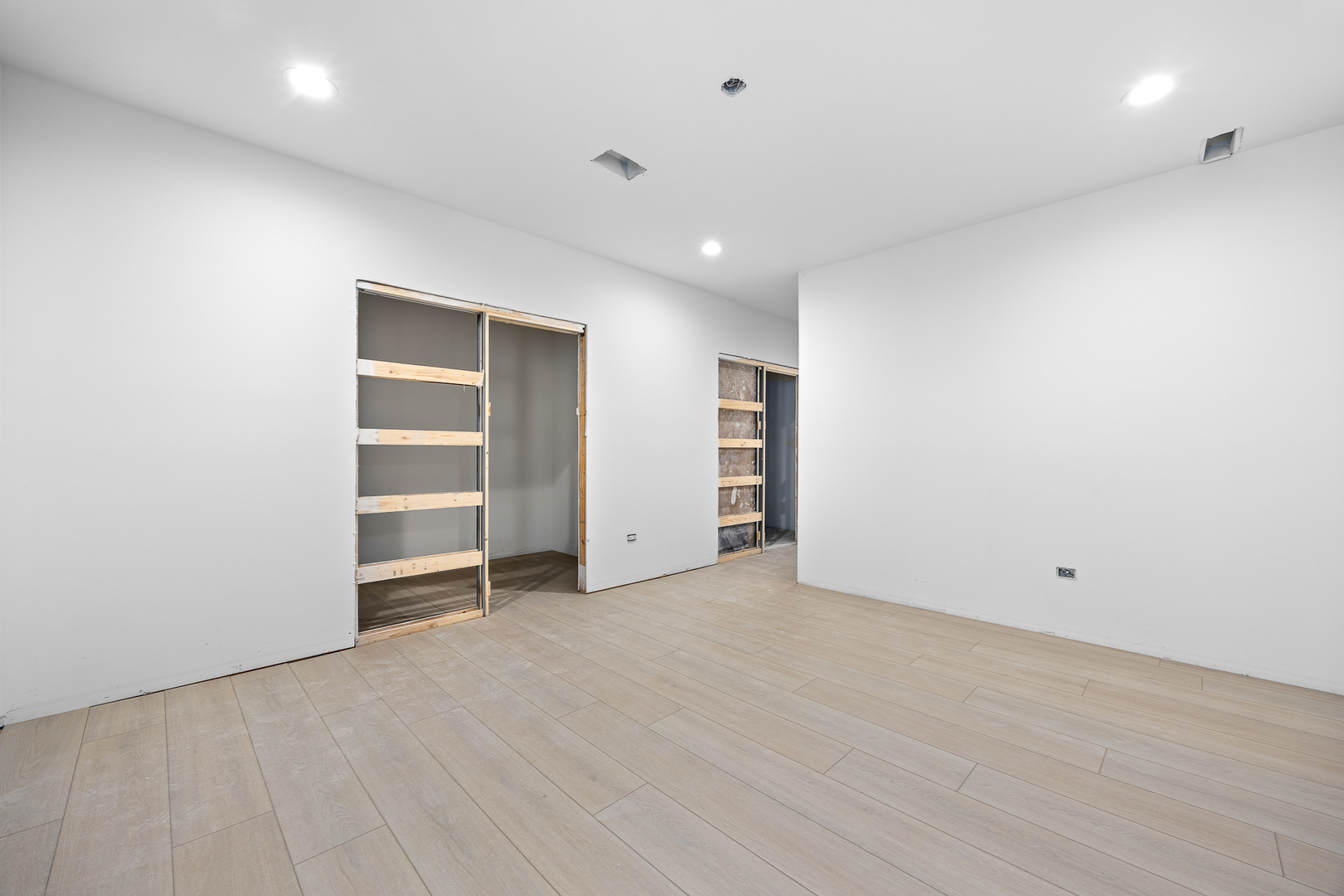 3408 South Carpenter Street Chicago, IL 60608 - Photo 16 of 16 an empty room with closet and windows
