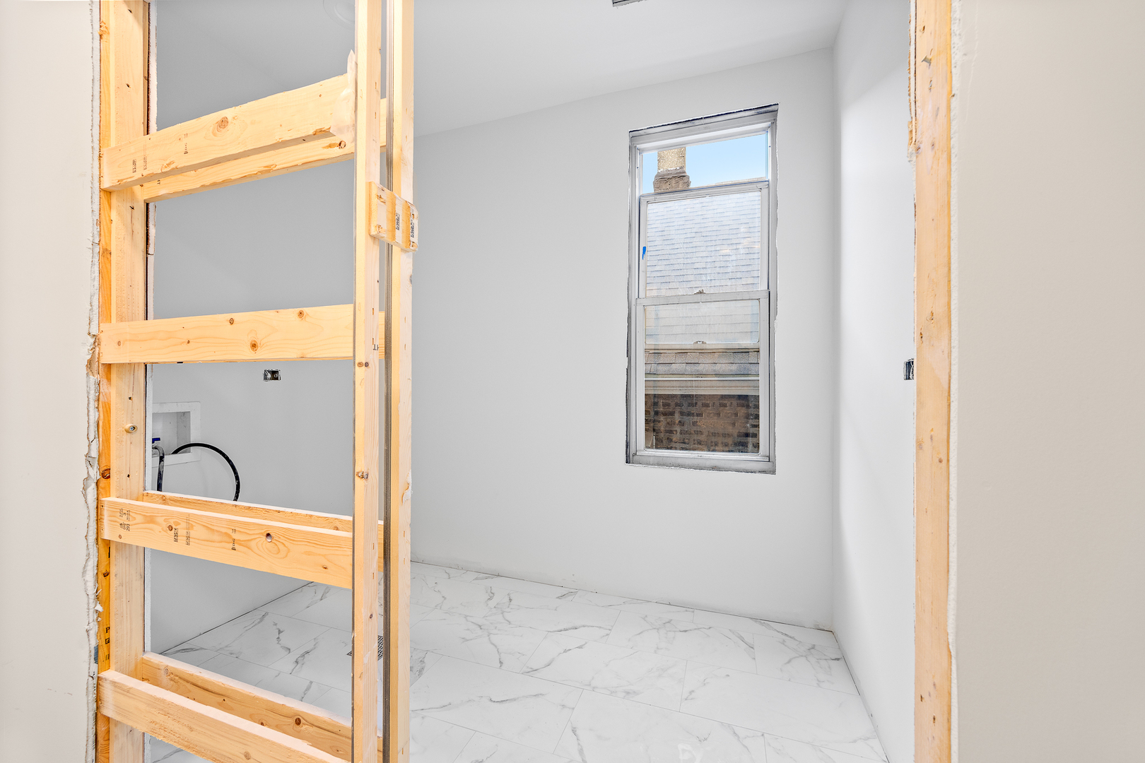 3408 South Carpenter Street Chicago, IL 60608 - Photo 6 of 16 a bathroom with a sink and mirror