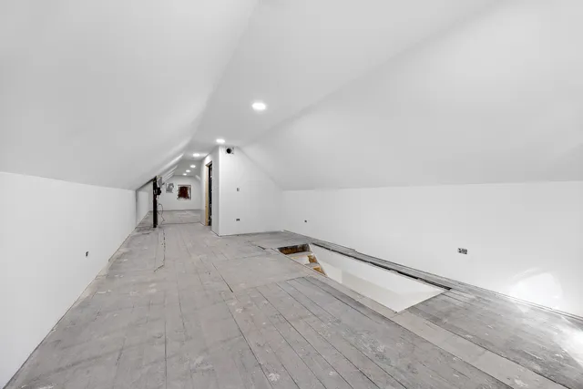 a view of a big room with wooden floor