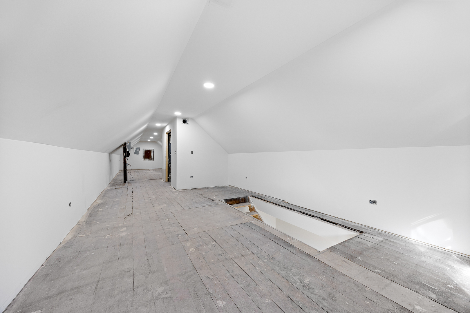 3408 South Carpenter Street Chicago, IL 60608 - Photo 10 of 16 a view of a room with rack on the wall