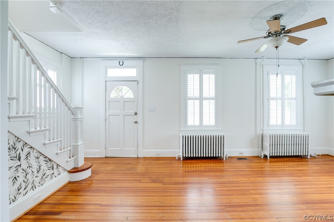 4604 Brook Road Richmond, VA 23227 - Photo 11 of 38 a view of an empty room with wooden floor and a window