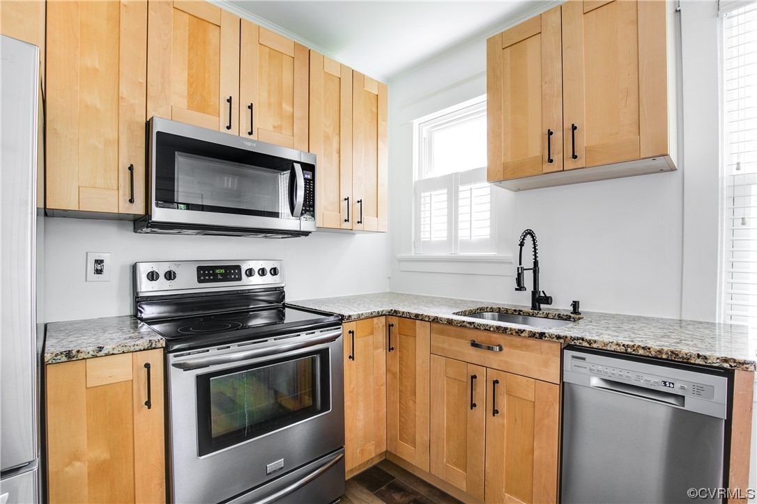 4604 Brook Road Richmond, VA 23227 - Photo 17 of 38 a kitchen with granite countertop cabinets stainless steel appliances and a window