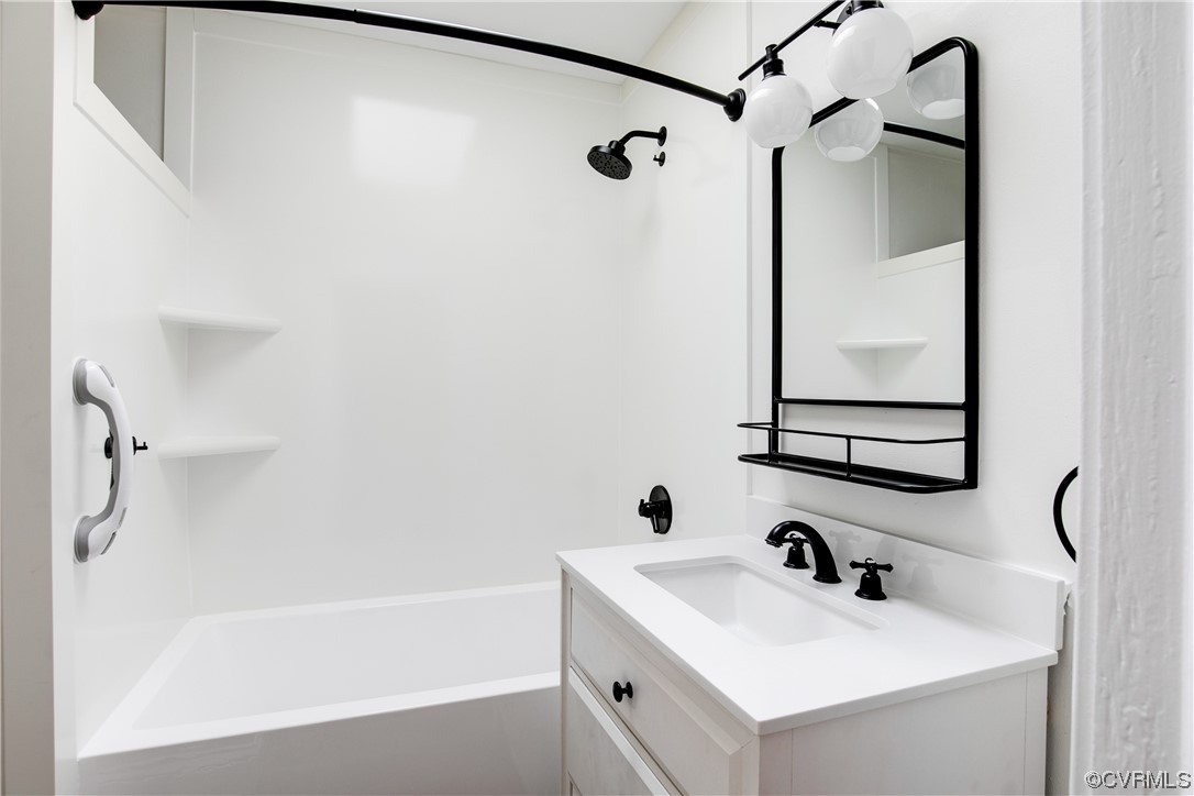 4604 Brook Road Richmond, VA 23227 - Photo 30 of 38 a bathroom with a sink and a bathtub