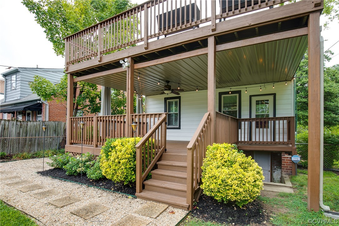 4604 Brook Road Richmond, VA 23227 - Photo 33 of 38 a view of a house with wooden floor fence and a porch