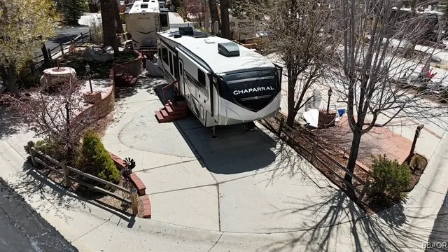 a buildings covered with tall trees