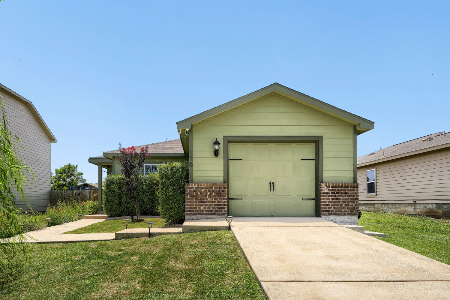 116 Millers Loop Jarrell, TX 76537 - Photo 3 of 23 Home has a front single car garage.