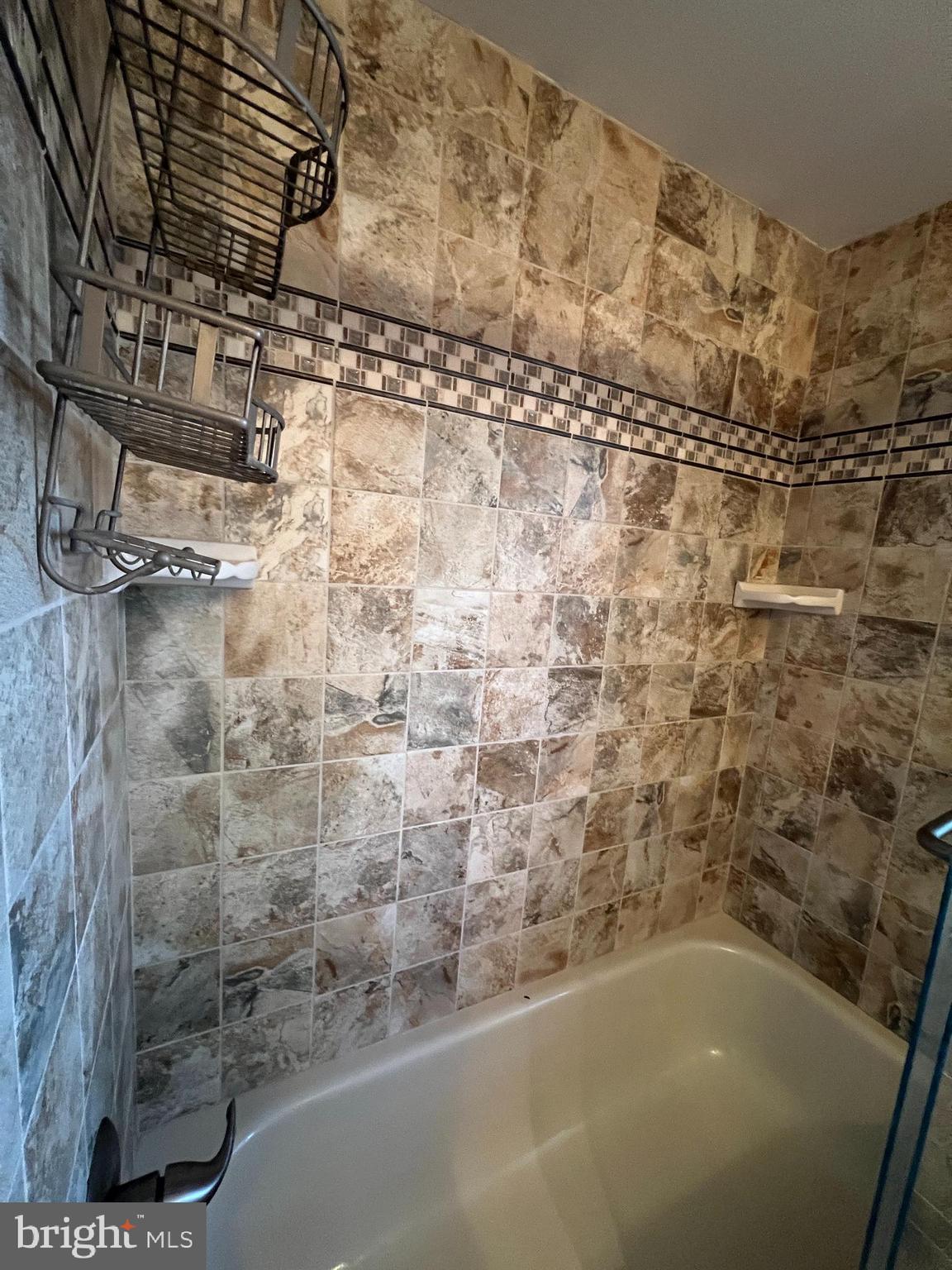 1701 Mountainview Drive, Unit 1701 Chesterbrook, PA 19087 - Photo 13 of 16 a bathroom with a bathtub