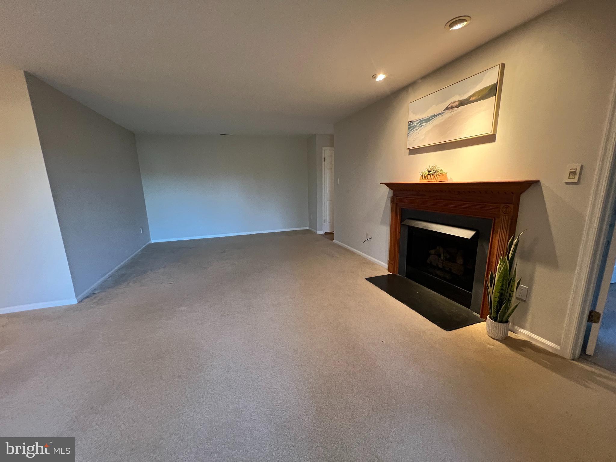 1701 Mountainview Drive, Unit 1701 Chesterbrook, PA 19087 - Photo 8 of 16 a view of empty room with a fireplace