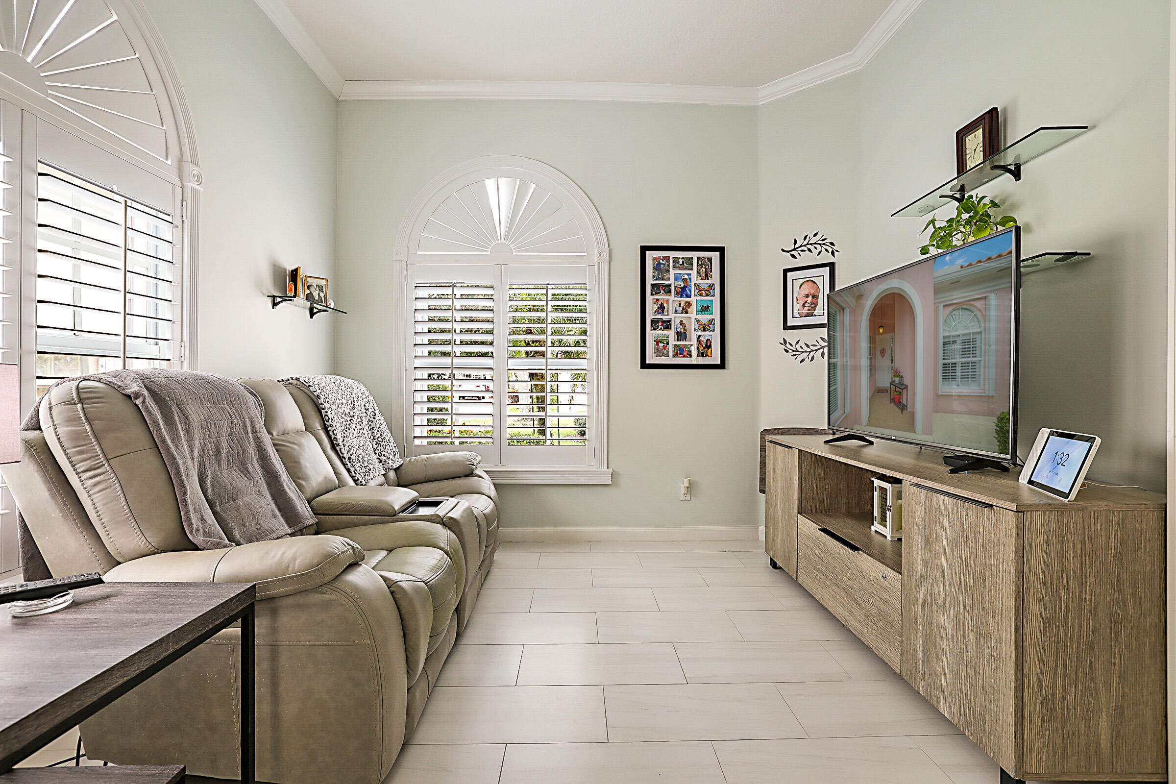 9520 Southwest Wedgewood Lane Stuart, FL 34997 - Photo 20 of 53 a living room with furniture and a flat screen tv