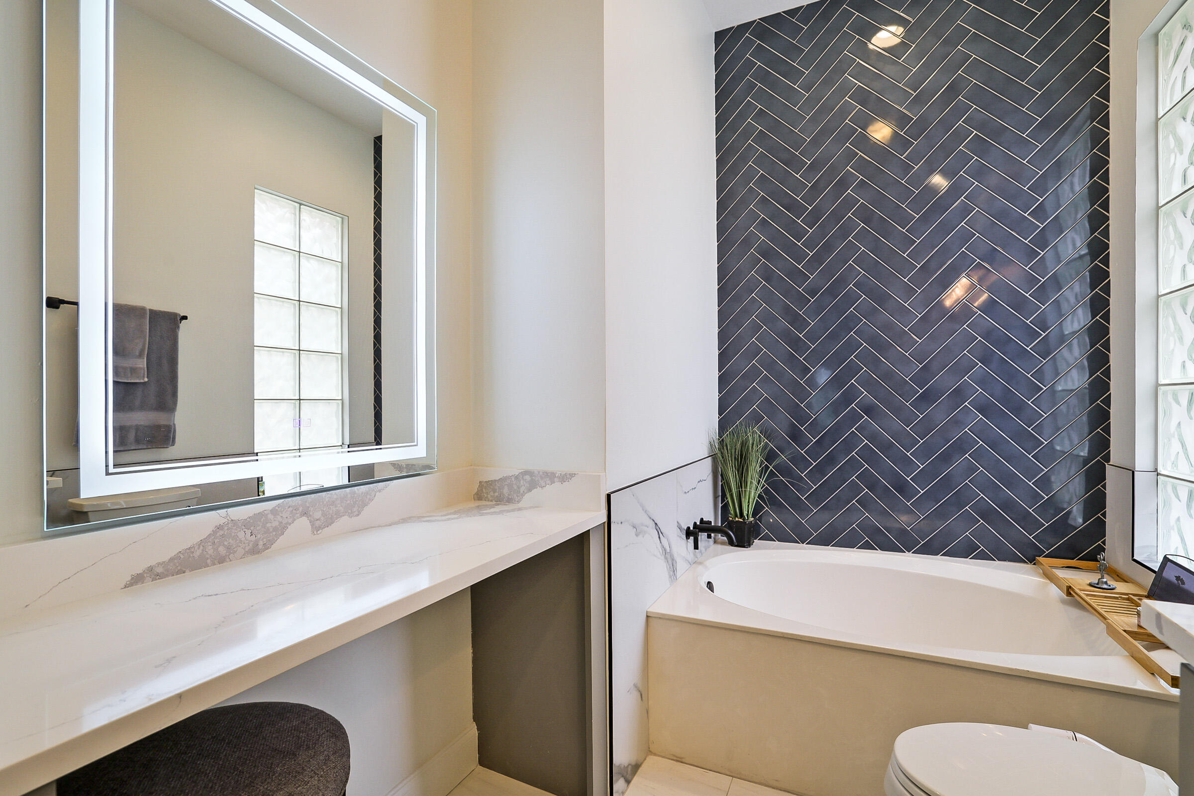 9520 Southwest Wedgewood Lane Stuart, FL 34997 - Photo 29 of 53 a bathroom with a sink and a mirror