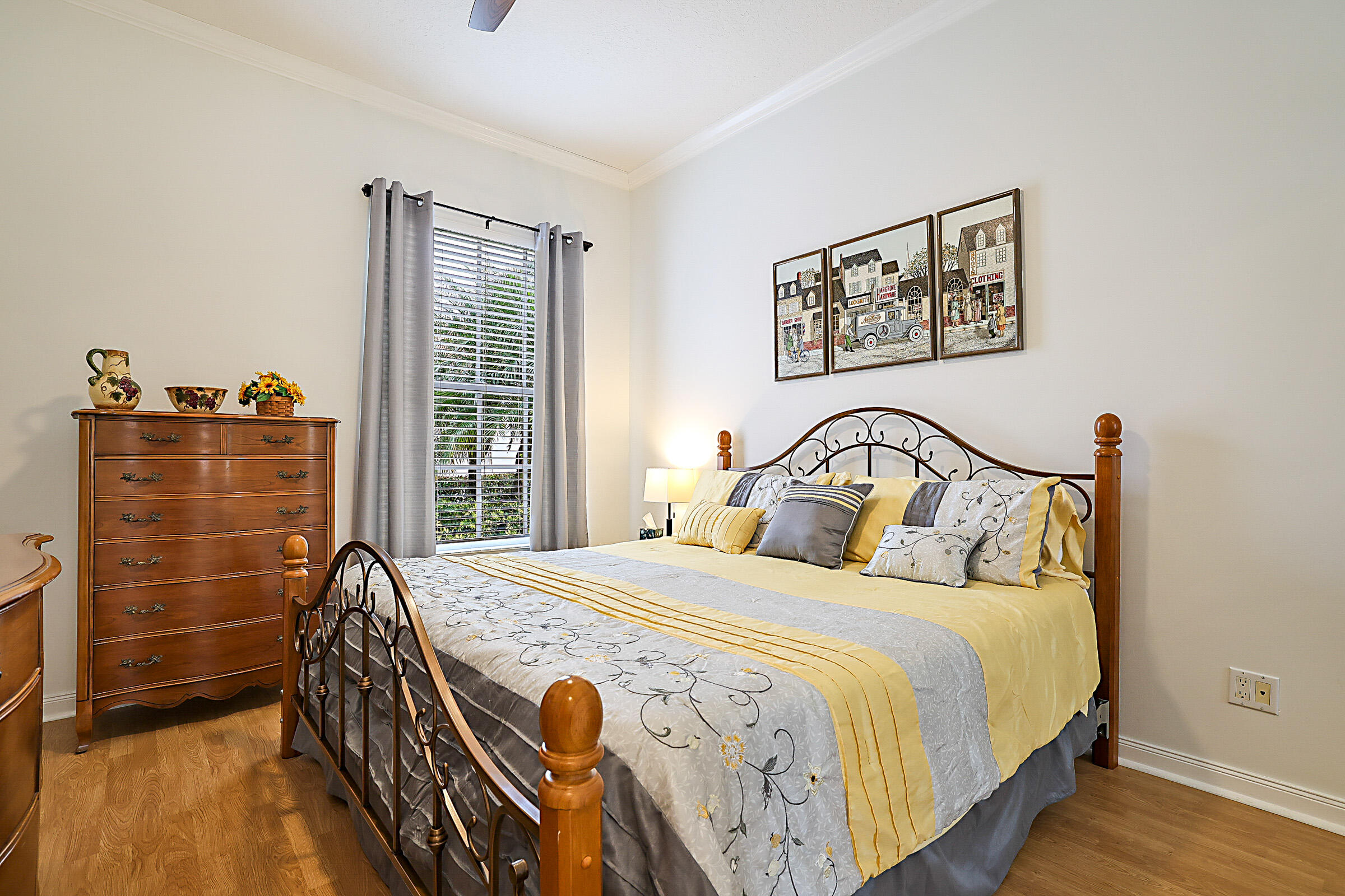 9520 Southwest Wedgewood Lane Stuart, FL 34997 - Photo 33 of 53 a bedroom with a bed and a dresser