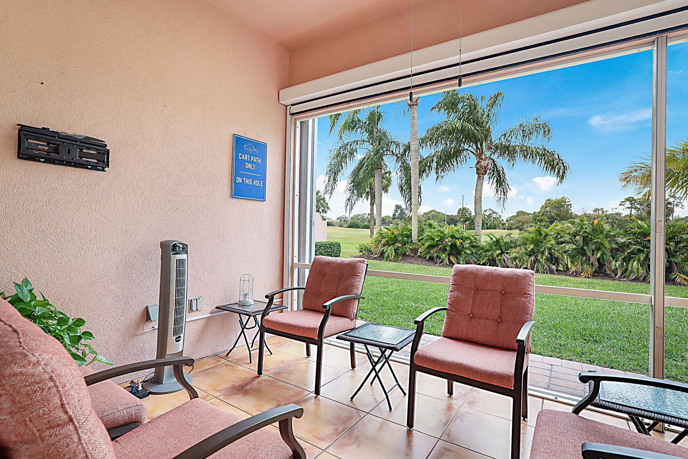 9520 Southwest Wedgewood Lane Stuart, FL 34997 - Photo 35 of 53 a outdoor view with a sitting space