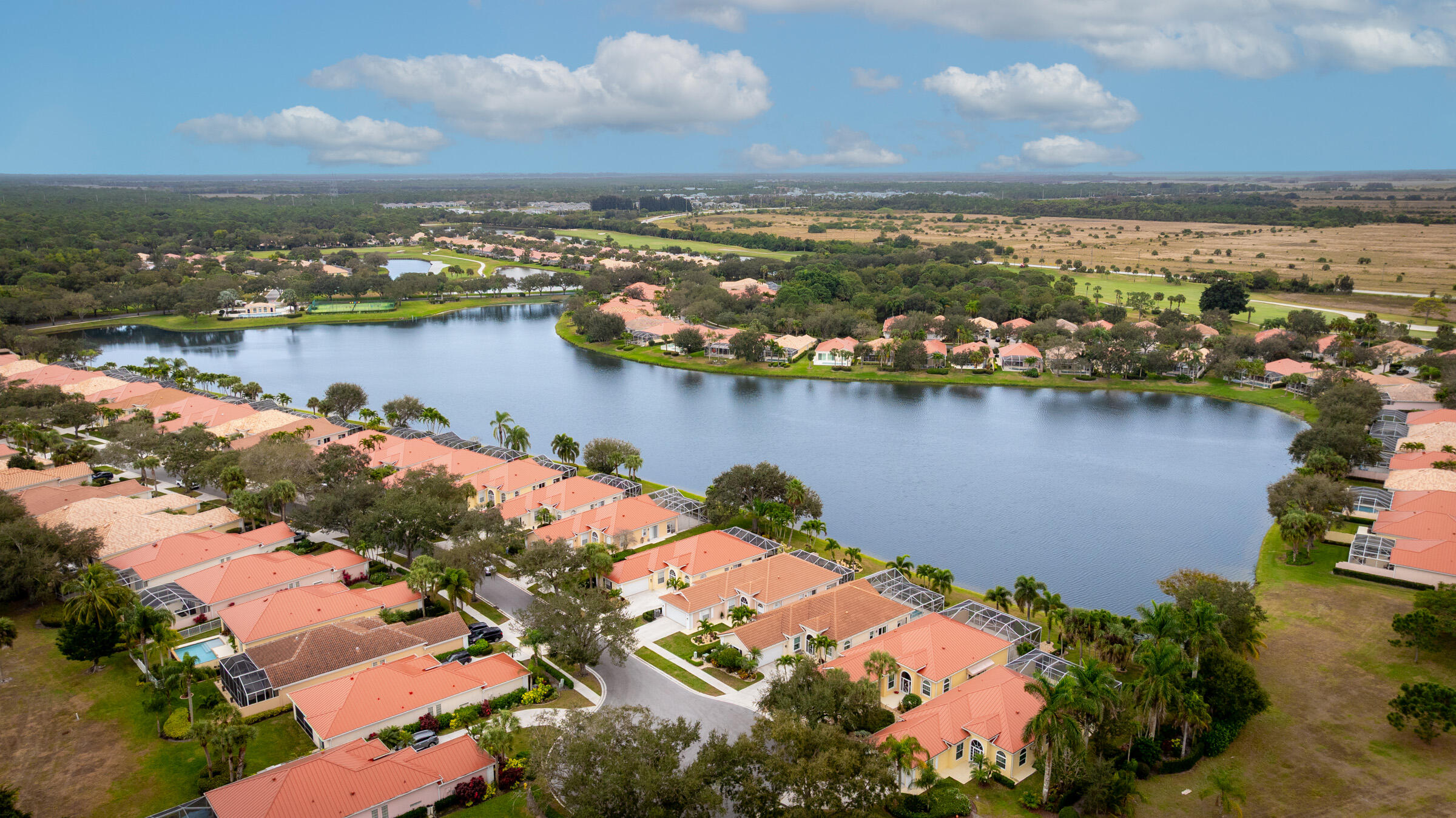 9520 Southwest Wedgewood Lane Stuart, FL 34997 - Photo 46 of 53 an aerial view of ocean and residential houses with outdoor space