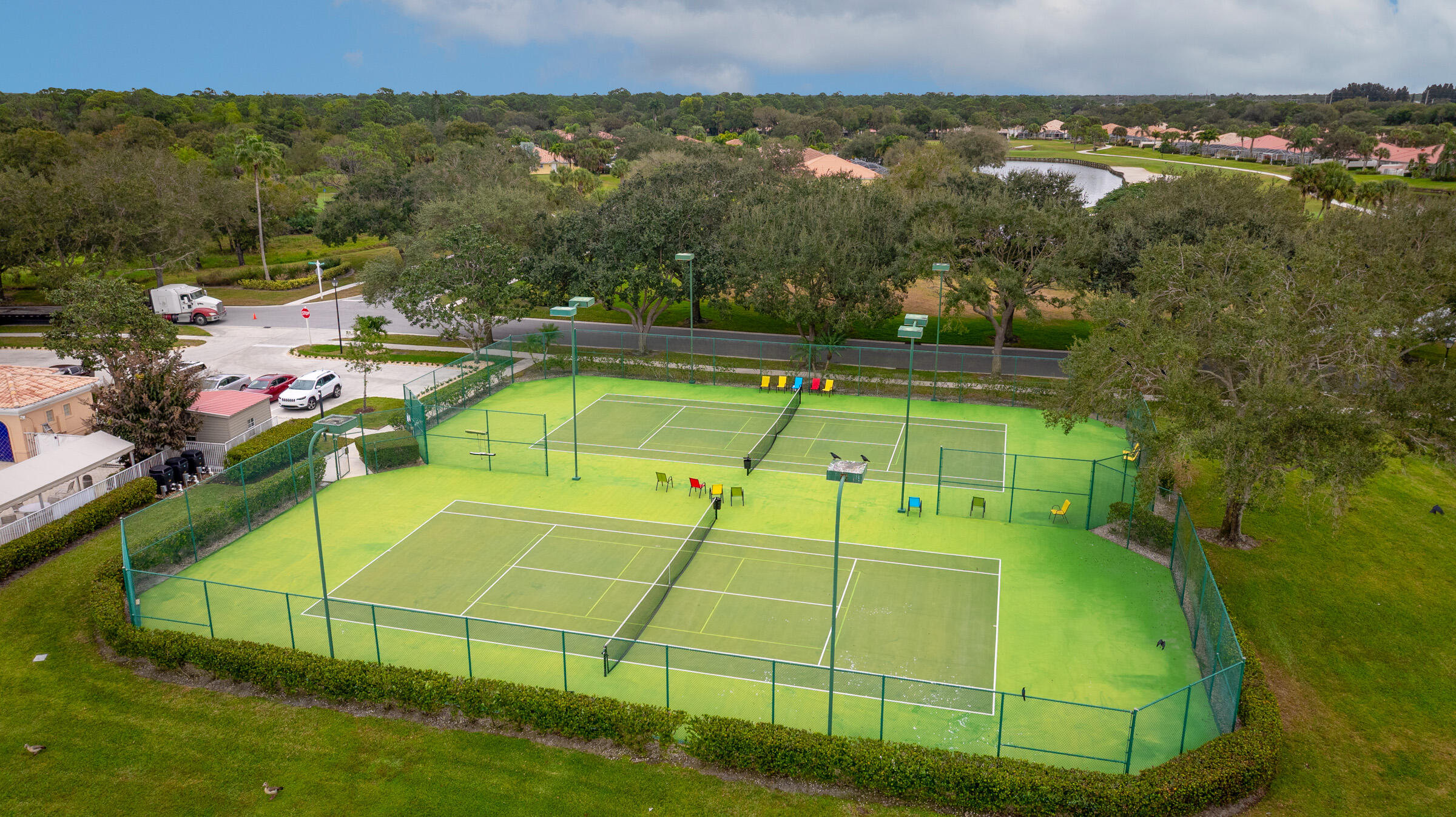 9520 Southwest Wedgewood Lane Stuart, FL 34997 - Photo 49 of 53 a view of a tennis ground