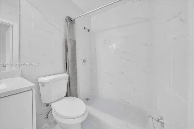 a large building with a clock tower in the middle