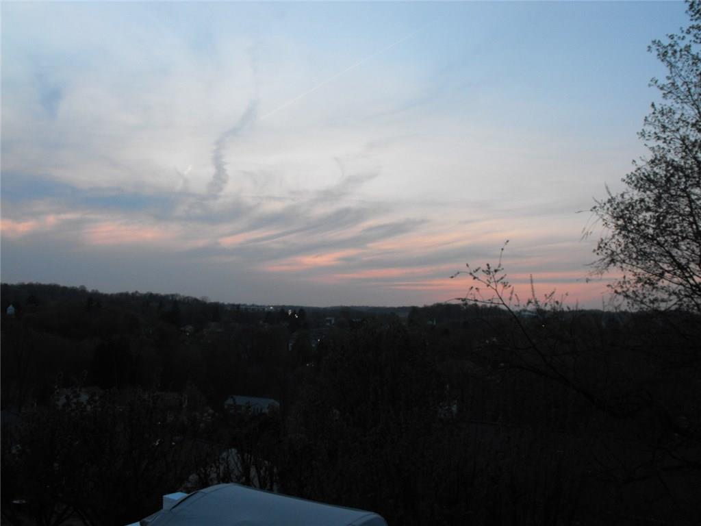 180 Barrington Ridge Delmont, PA 15626 - Photo 22 of 22 Share a glass of wine and the beautiful sunset with friends on the rear deck.