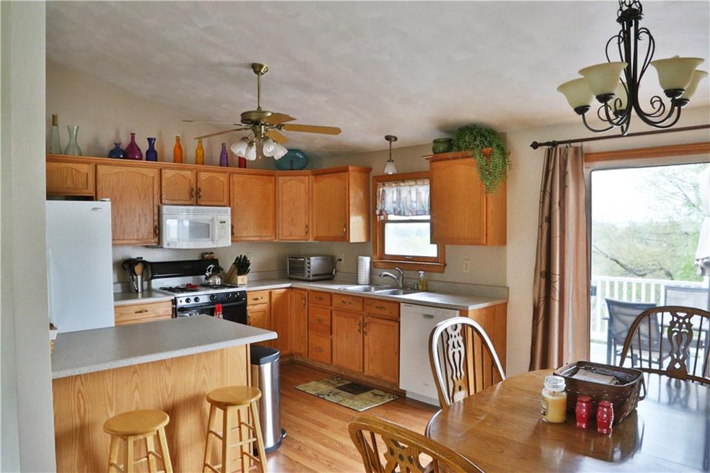 180 Barrington Ridge Delmont, PA 15626 - Photo 8 of 22 The open concept great room is perfect for entertaining. It features large rooms and many windows to flood the room with light. The Kitchen is open to the dining area and it features plenty of counter space and an island.