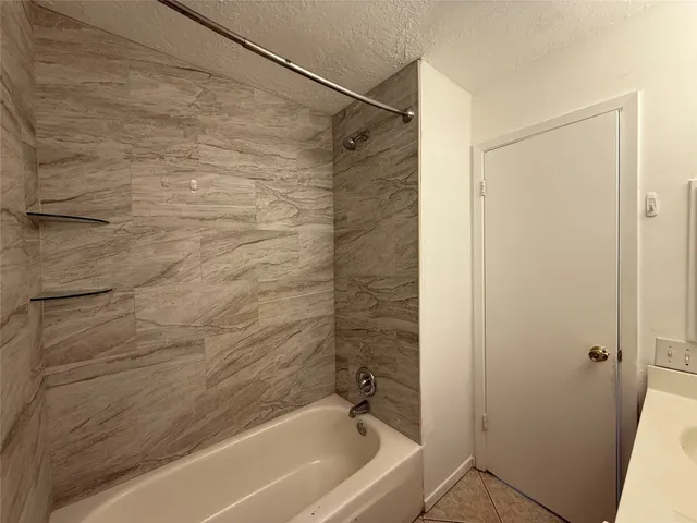 a bathroom with a bathtub