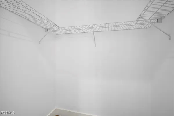 a view of a room with racks on the wall